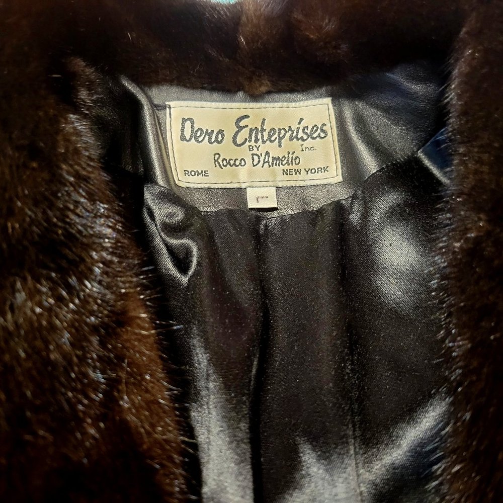 Long, full grain leather black coat with silk lining, mink cuffs and collar
